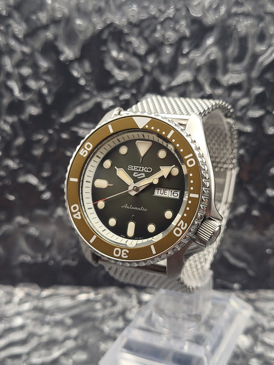 Seiko 5 - SRPD75K1 - 4R36-07G0 - Automaat - Mesh Band - Red Robin Watches