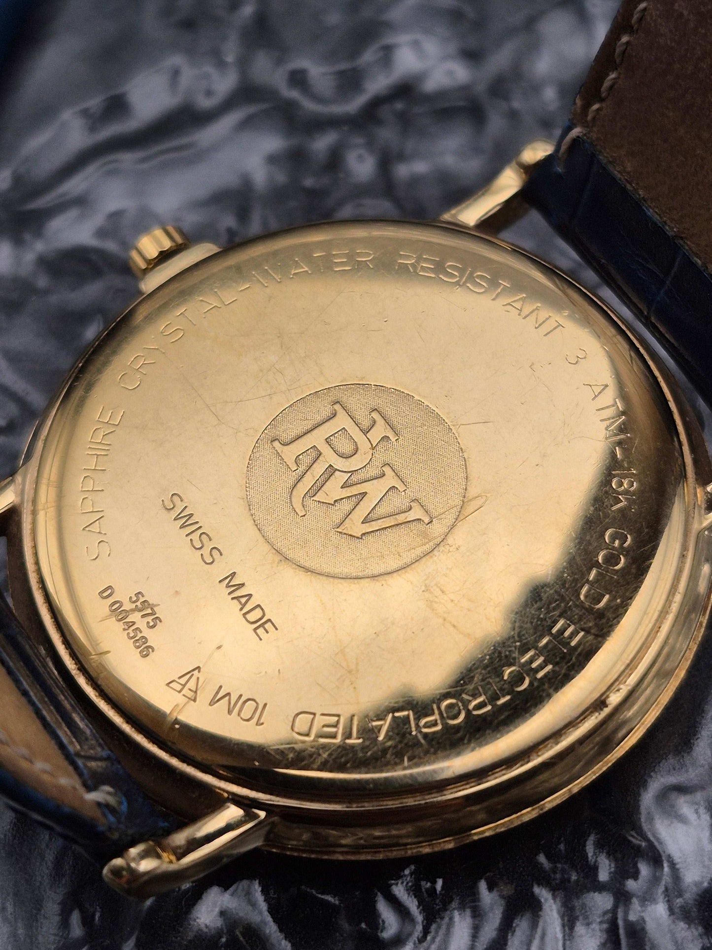 Raymond Weil Ref. 5575 18K EGP Roman Numerals Quartz