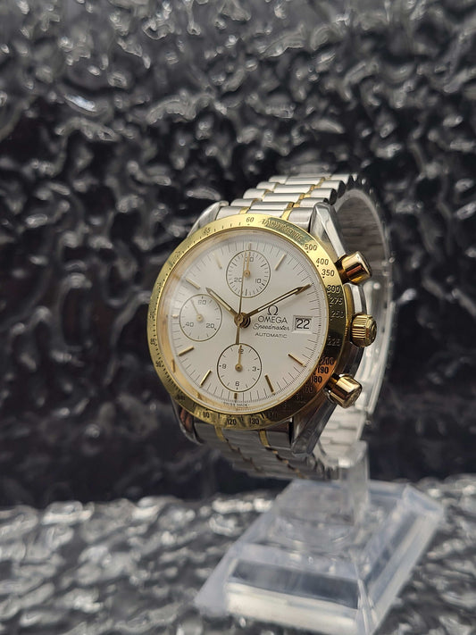 Omega Speedmaster Reduced Date - Ref. 3311.20.00 - Goud en Staal - Red Robin Watches