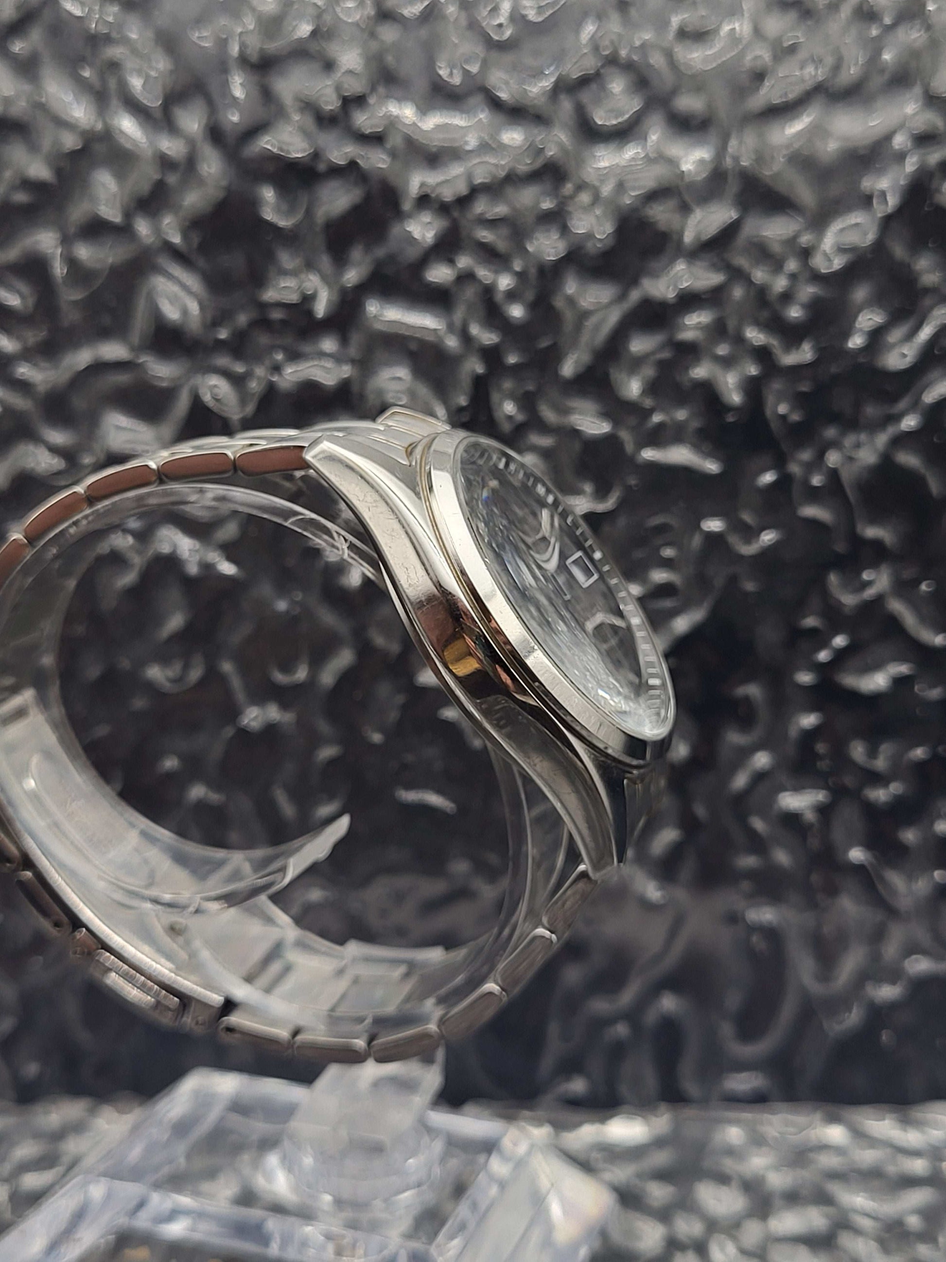 Citizen Eco-Drive Solar - Ref. H110-S077486 - Datum - JDM