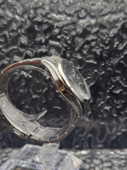 Citizen Eco-Drive Solar - Ref. H110-S077486 - Datum - JDM