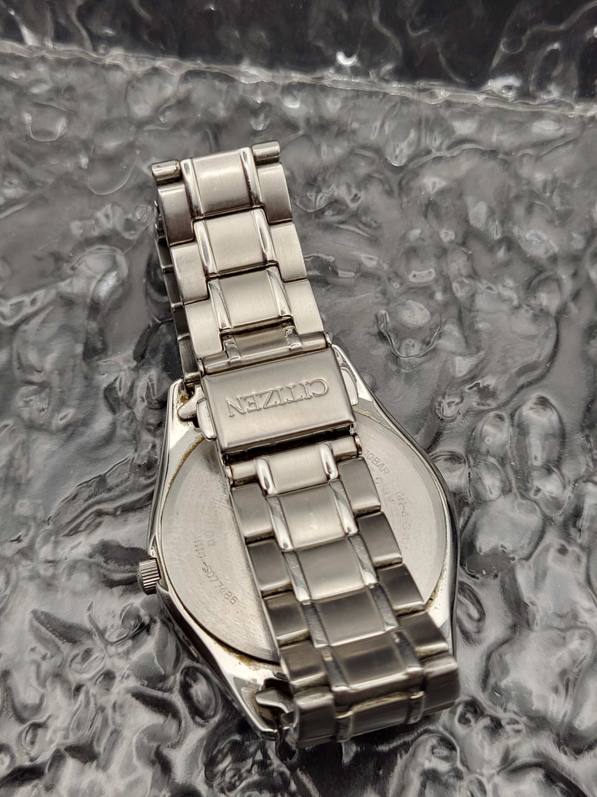 Citizen Eco-Drive Solar - Ref. H110-S077486 - Datum - JDM
