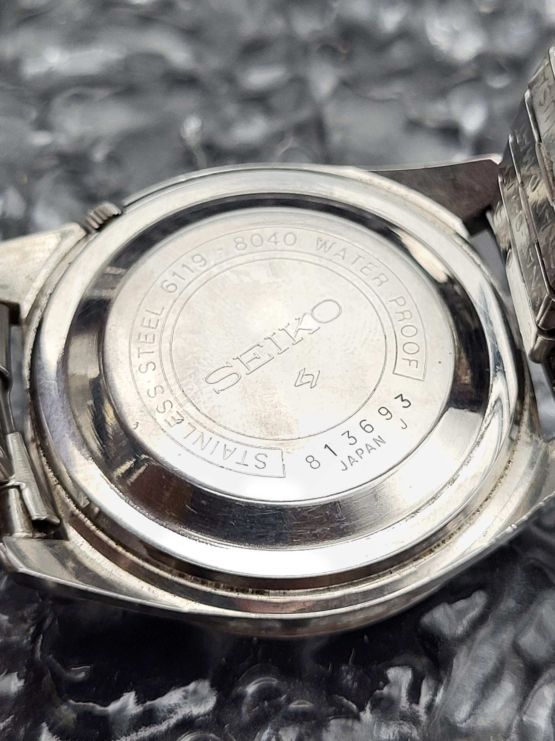 Seiko 5 - Ref. 6119-8040 - Dag Datum - Zilveren Sunburst