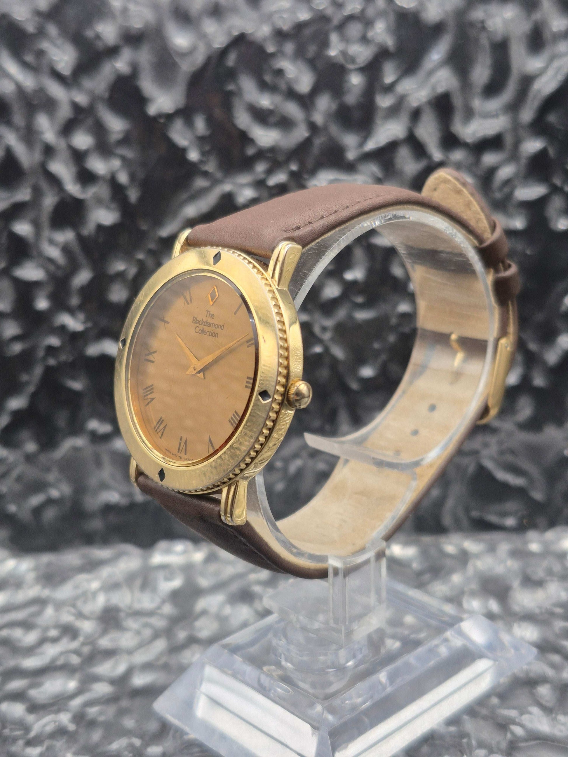 Seiko Black Diamond Collection Ref. 5P30-7020 Rotating Bezel - Red Robin Watches