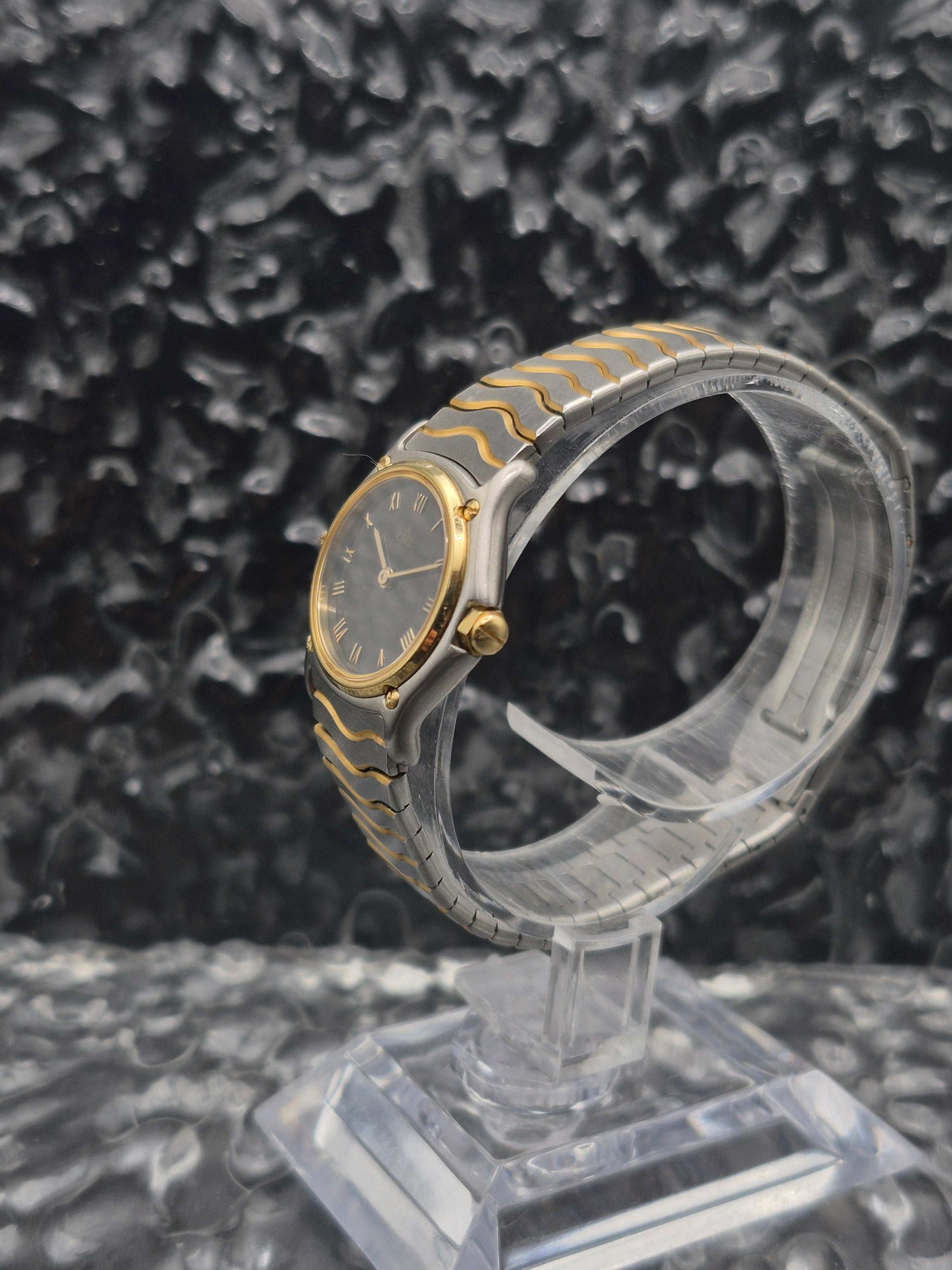 Ebel Classic Wave Ref. 1057901 Quartz Gold Bezel Black Dial