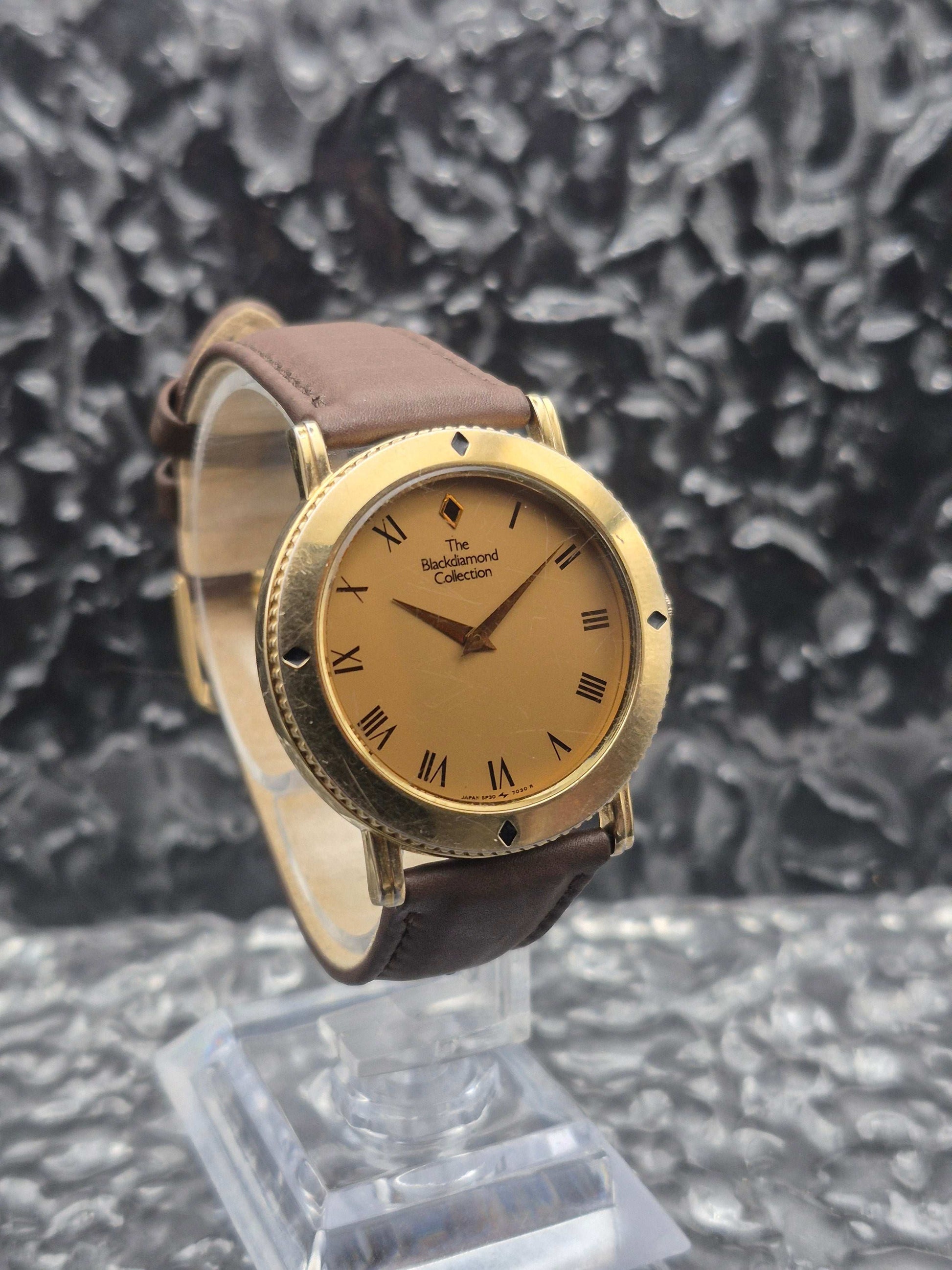 Seiko Black Diamond Collection Ref. 5P30-7020 Rotating Bezel - Red Robin Watches