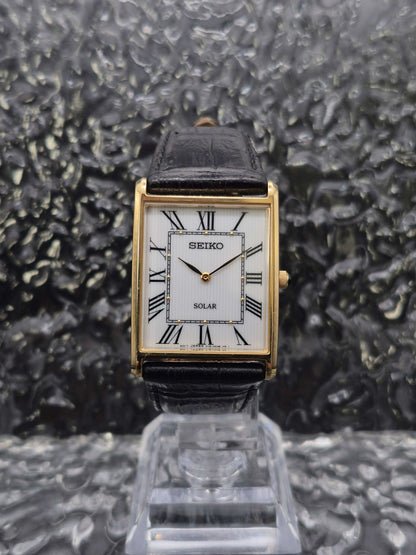 Seiko Solar Tank Ref. V115-0BC0 Gold Tone Roman Numeral Men's - Red Robin Watches