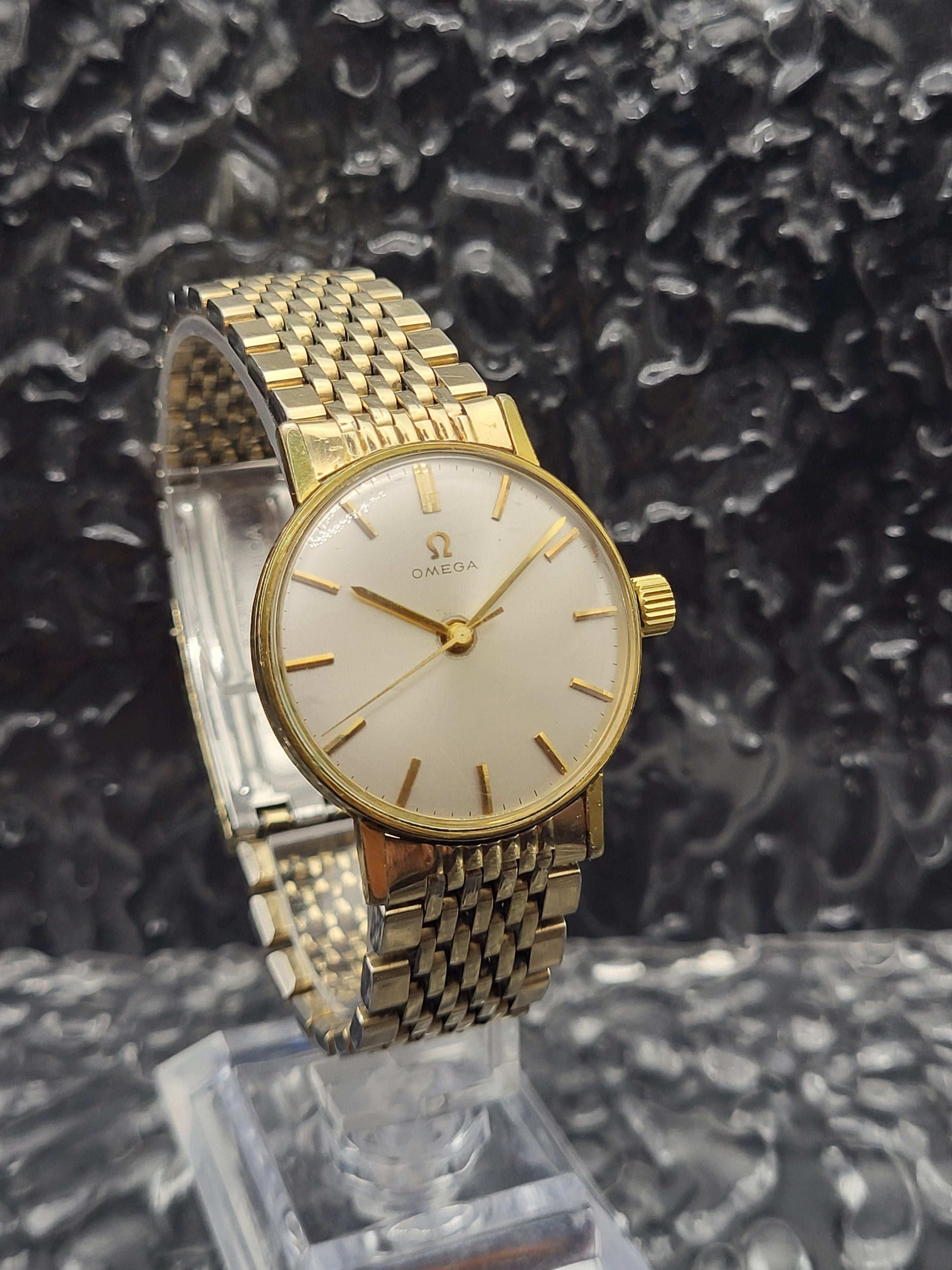Omega - Ref. 131.004 - Cal. 600 - Manual - Zilveren Wijzerplaat - Goudkleurig - Red Robin Watches