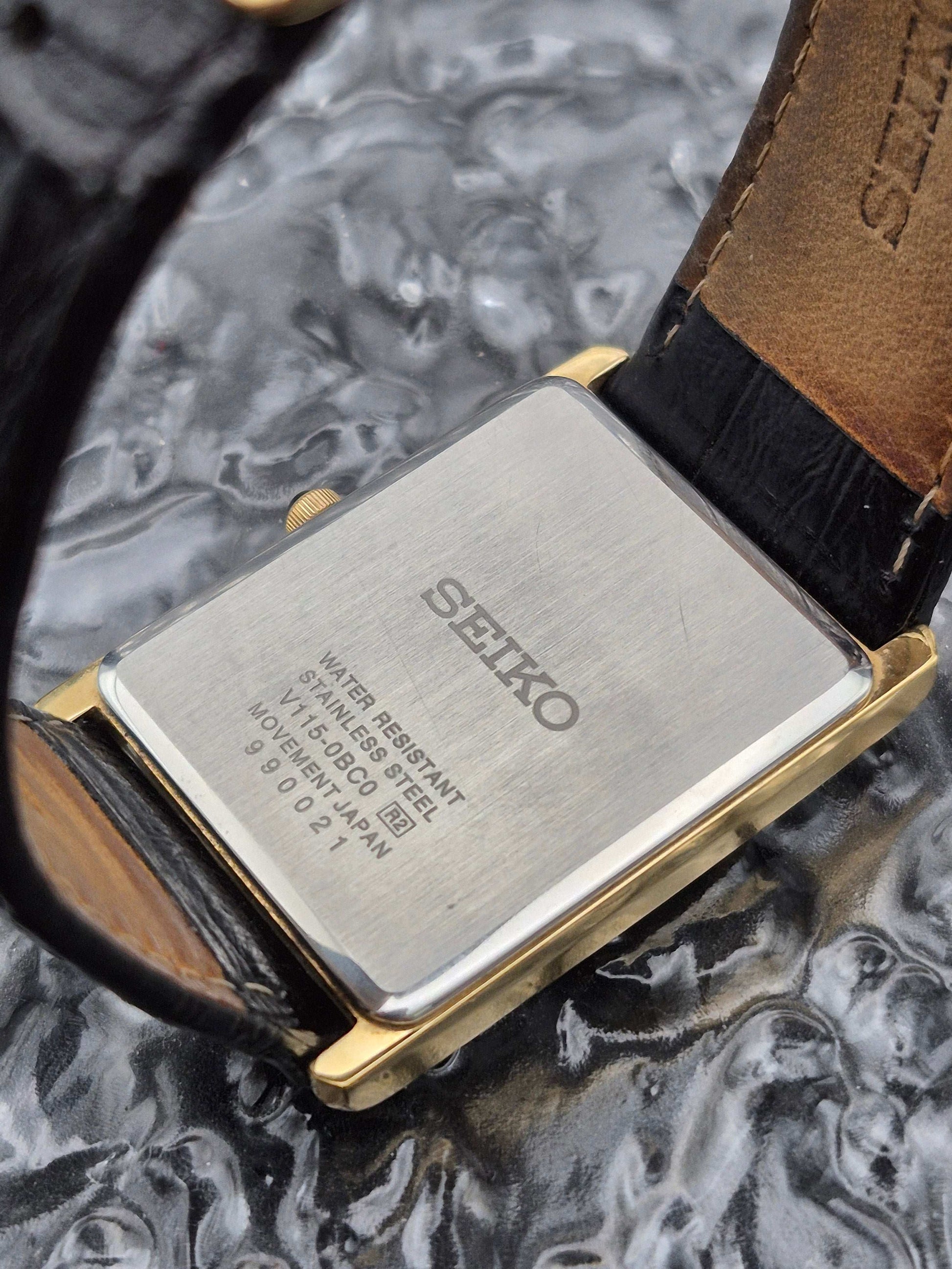 Seiko Solar Tank Ref. V115-0BC0 Gold Tone Roman Numeral Men's - Red Robin Watches