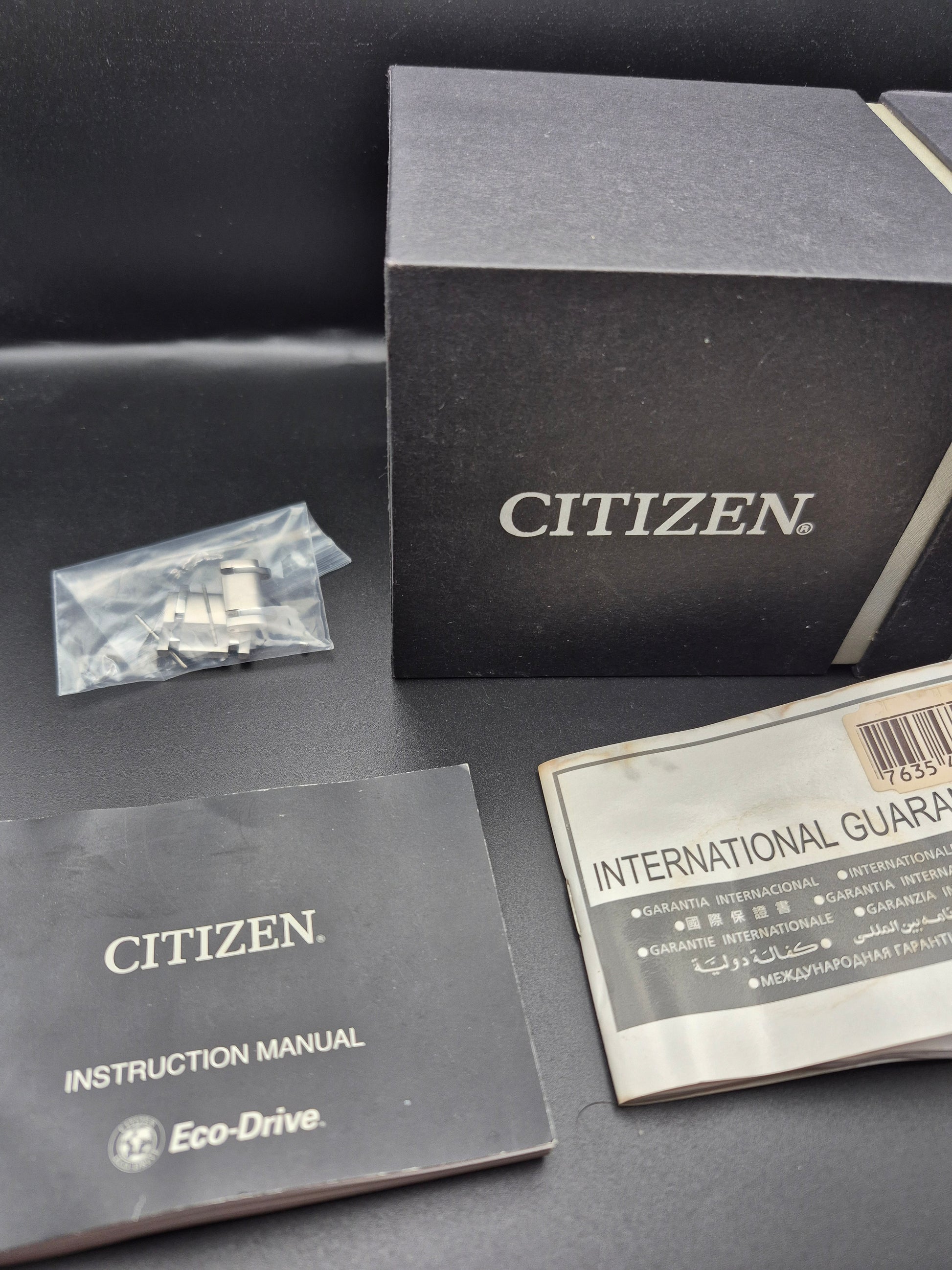 Citizen Titanium Eco-Drive Ref. AW1240-57L Full Set Solar - Red Robin Watches